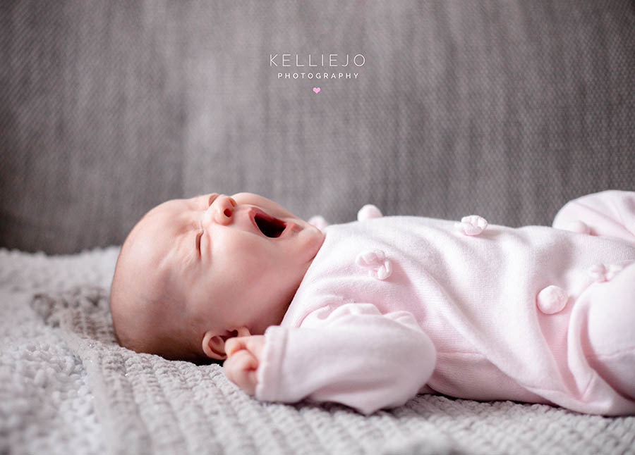 newborn baby yawning